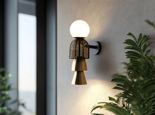 Totem Black Wall Lamp with handwoven steel baskets stacked in a bold totemic design.